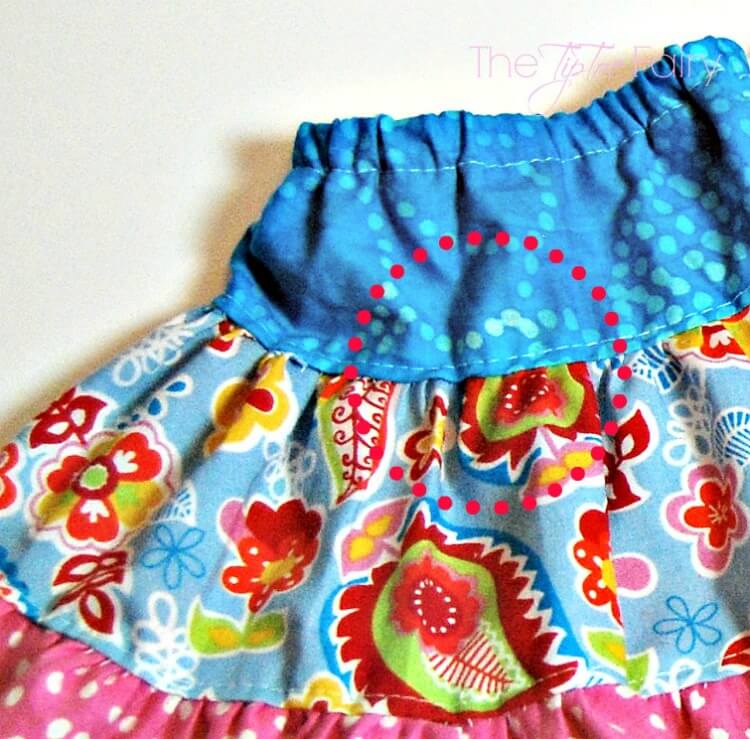 Topstitch the layers of the Doll Twirly Skirt