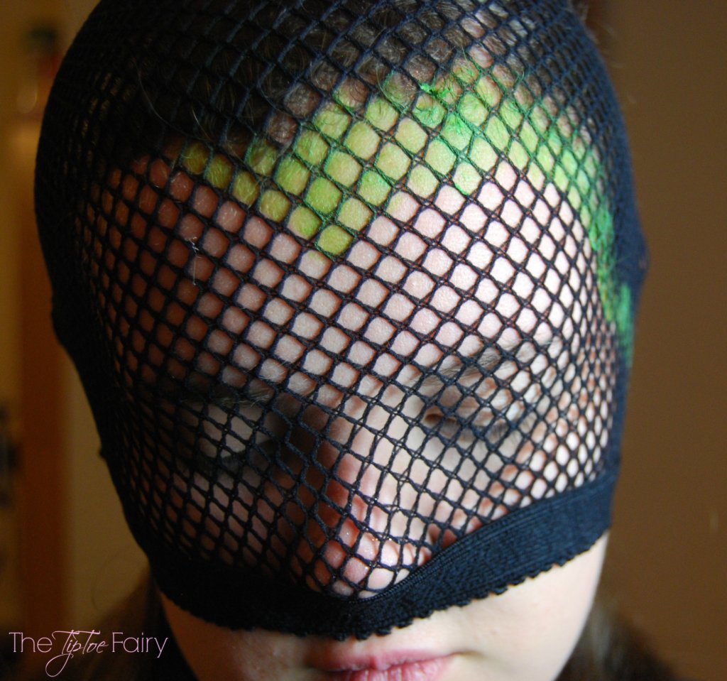 Green eyeshadow in the fishnet