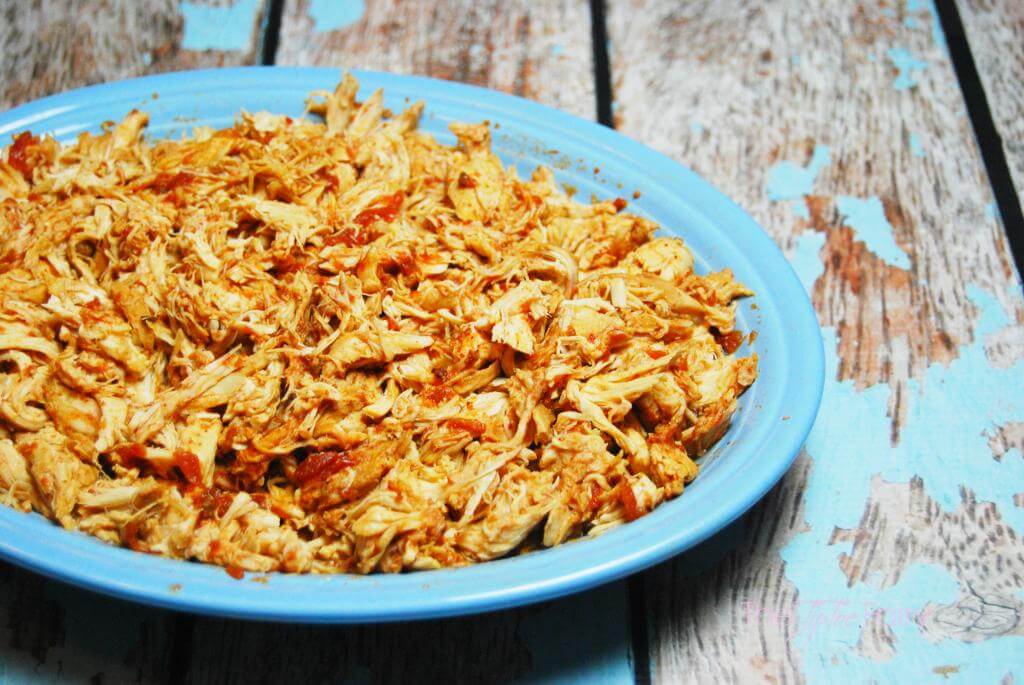 A big plate of shredded chicken made with just chicken breasts and salsa. 