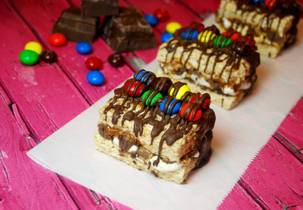 Kitchen Sink Krispies Sandwiches - fun snack and feel-good treat. An easy hack for ready made Rice Krispies Treats full of marshmallow butter, dulce de leche, chocolate, and more! | The TipToe Fairy #KreateMyHappy #Ad