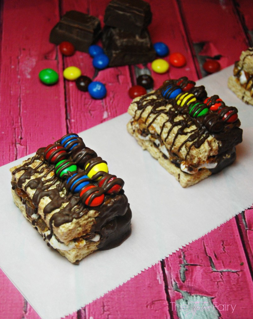 Kitchen Sink Krispies Sandwiches - fun snack and feel-good treat. An easy hack for ready made Rice Krispies Treats full of marshmallow butter, dulce de leche, chocolate, and more! | The TipToe Fairy #KreateMyHappy #Ad