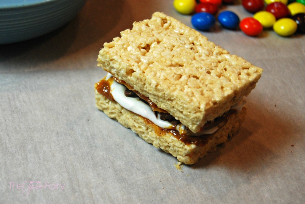 Kitchen Sink Krispies Sandwiches - fun snack and feel-good treat. An easy hack for ready made Rice Krispies Treats full of marshmallow butter, dulce de leche, chocolate, and more! | The TipToe Fairy #KreateMyHappy #Ad