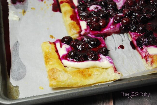 Easy Summer Berry Tart - puff pastry, vanilla bean cream cheese, and a quick blueberry compote make this a fast and delicious recipe! | The TipToe Fairy #CBSCrew