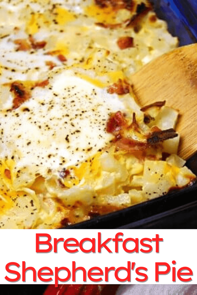 Close up view of Breakfast Shepherd's Pie with a wooden spoon. 