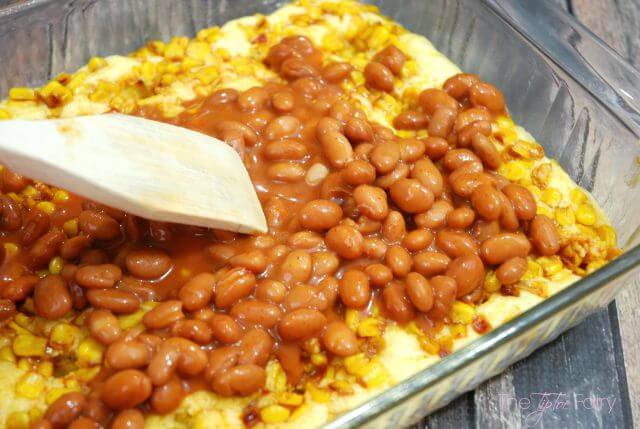 Layer the ranch style beans in the Cowboy Brisket Casserole