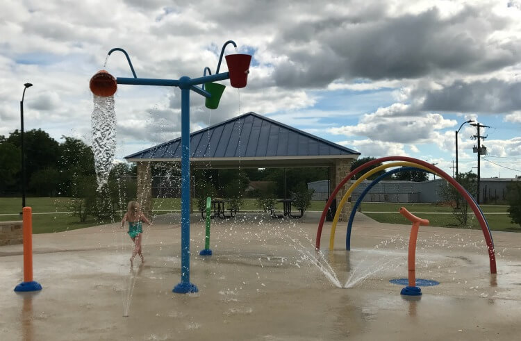 I love to take the kids to cool off at the splash pad and have my #YoplaitMixIns! #CreamyCrunchyYoplait #ad