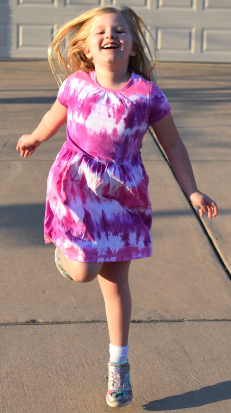 She loves her new tie dye dress!