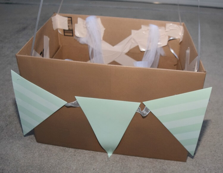 Add the party bunting to the box