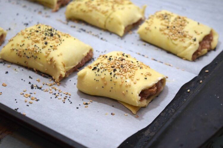 Sausage Meatloaf Rolls with sesame and poppy seeds