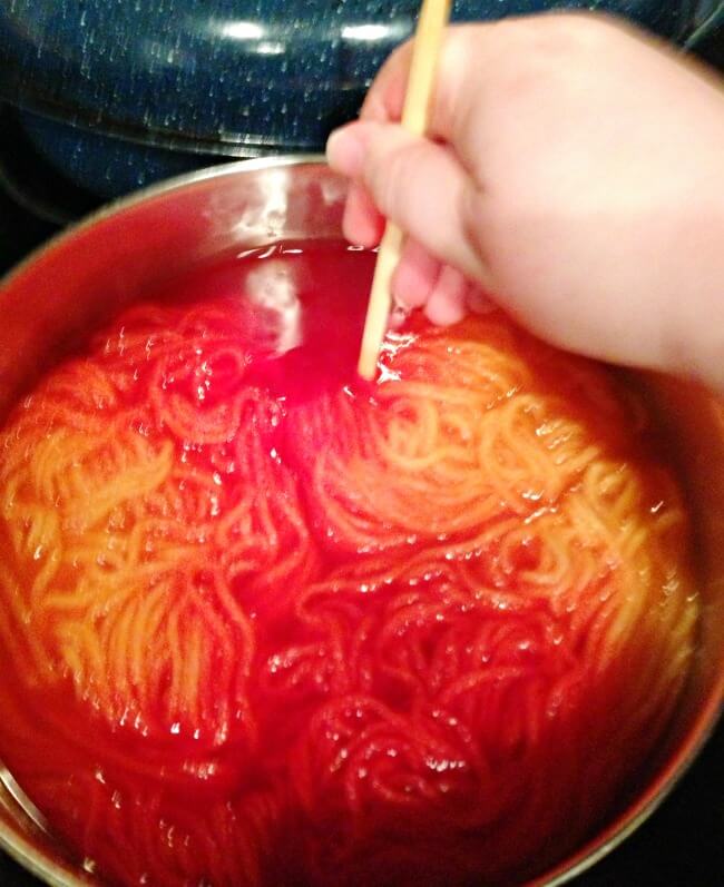 Adding the dye to the pot