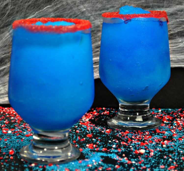 Two glasses of the blue leprechaun drink the Elixir of Fortune