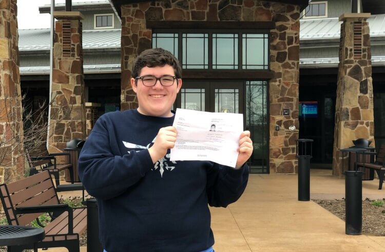 Teenage boy getting his driver's license.