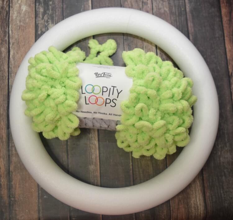 You will need 2 skeins of this loop yarn and a 16-inch styrofoam wreath. 