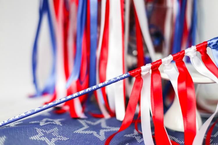 An individual DIY patriotic flag waving wand. 