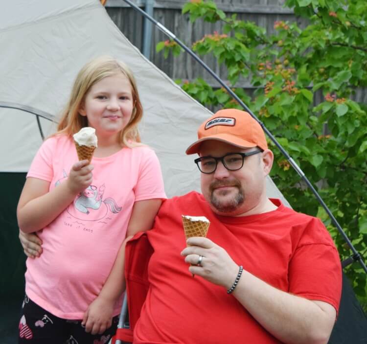 Daddy and daughter enjoying some Do Root Beer Floats make you think of your childhood? Come see how I recreated my favorite childhood memory with my kids and get the recipe for my super easy and delicious no churn root beer float ice cream!