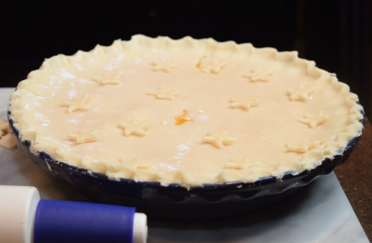 My finished apricot pie ready for baking and topped with stars. 