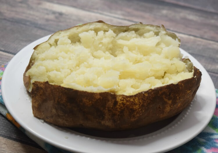 https://thetiptoefairy.com/wp-content/uploads/2019/06/jumbo-baked-potato-open.jpg