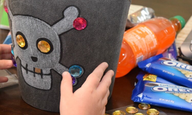 Have the kids add some rhinestone sticker jewels to the treasure box. 