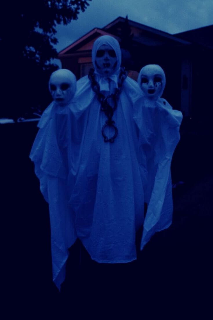 A very dark view of the three-headed ghost halloween costume