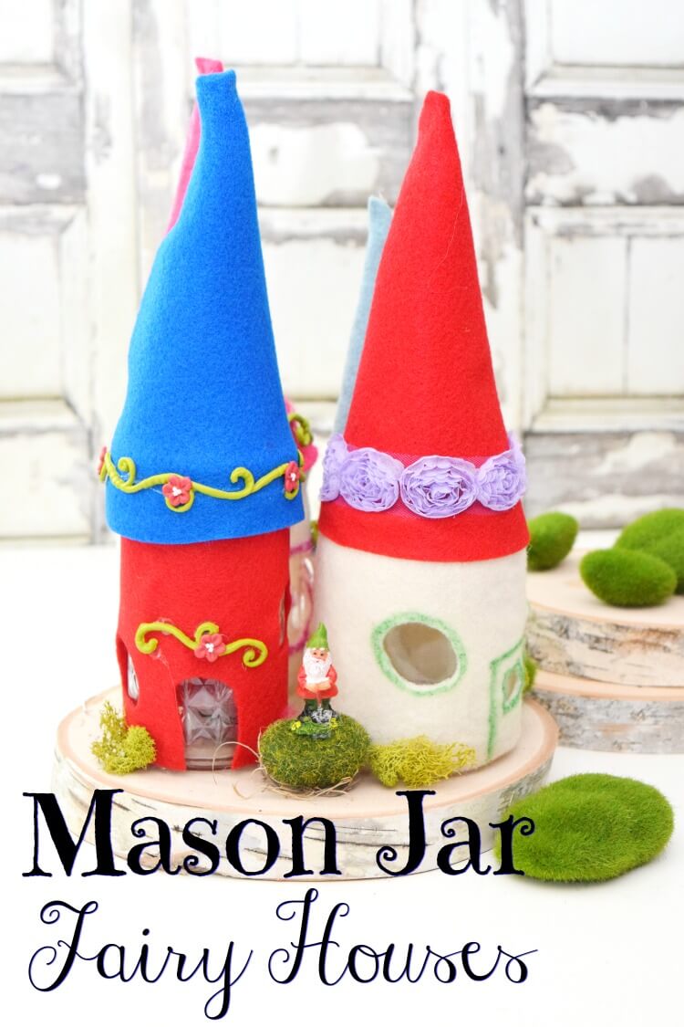 Mason Jar Fairy Houses on a wood slab
