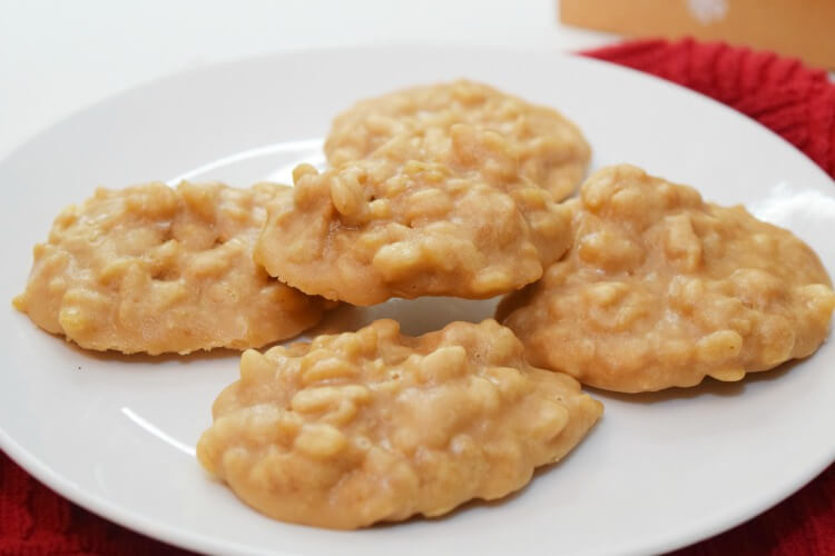 A close up of a white plate full of nut free pralines. 
