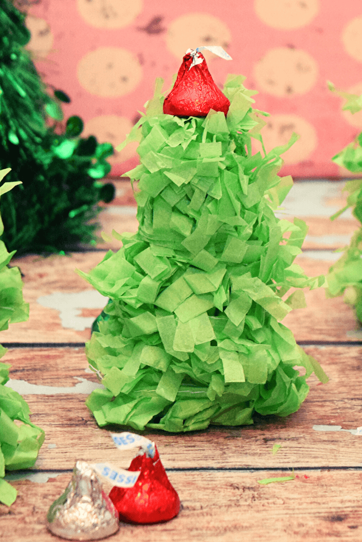 An extremely closeup view of the mini christmas tree pinata. 