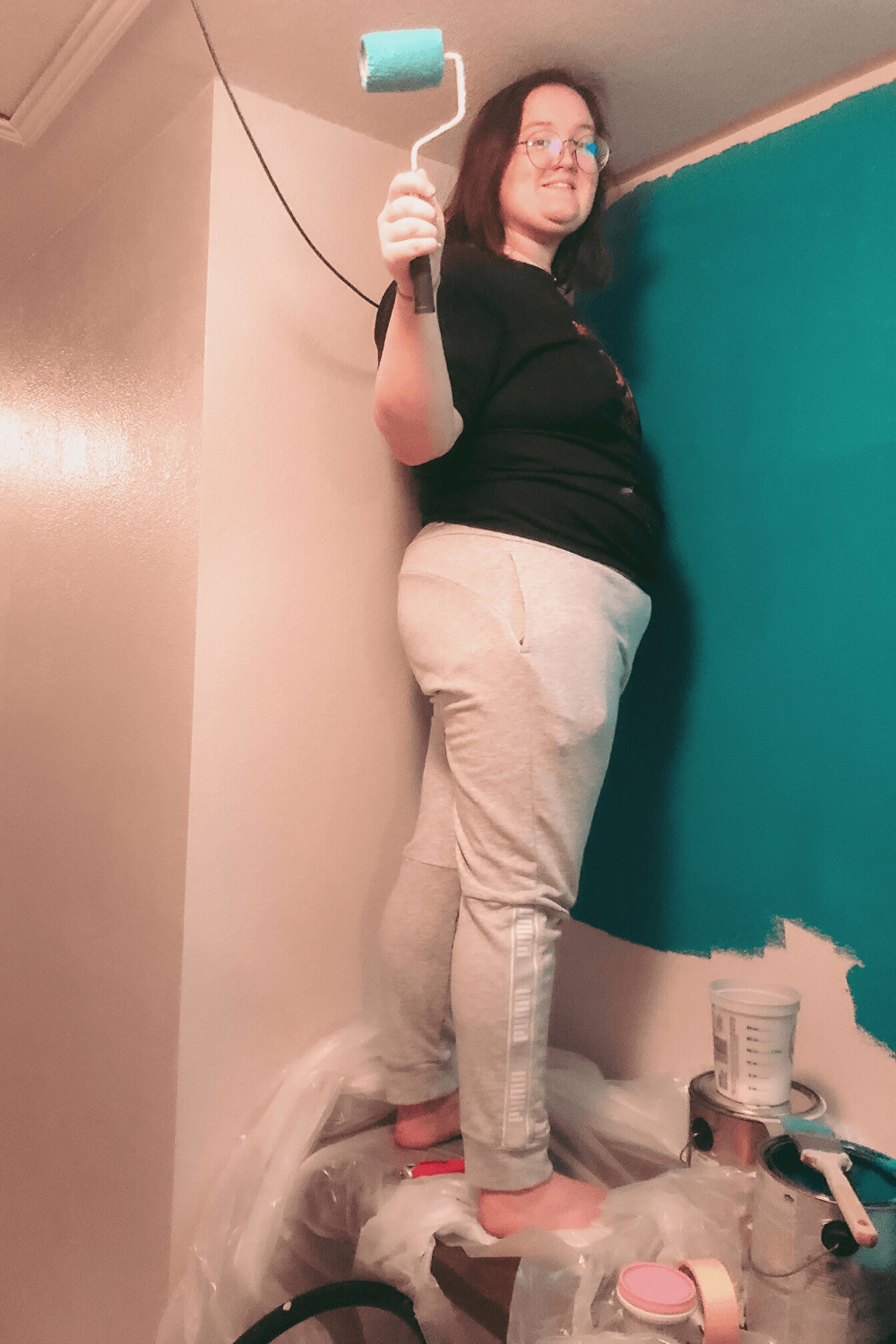 Repainting during our DIY Hallway Makeover.
