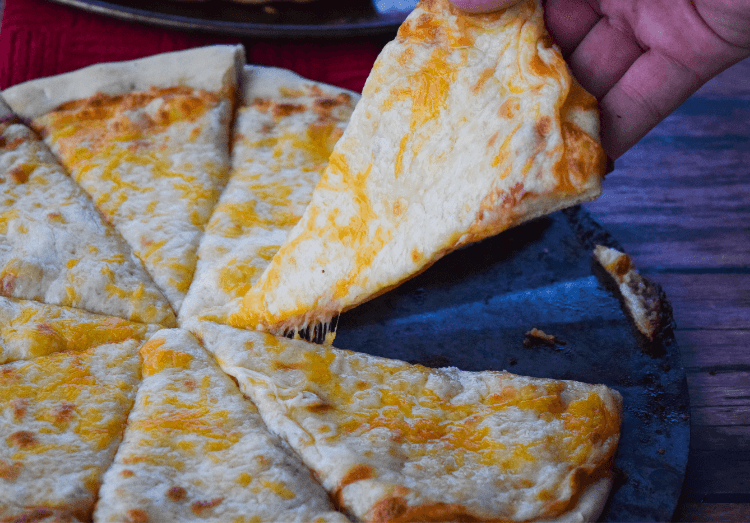 Gooey cheese pizza made fresh at home. 