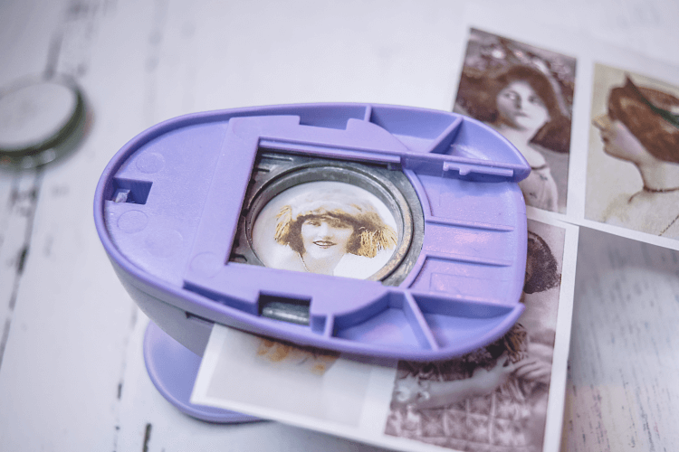 How to punch out the vintage images with the hole punch.