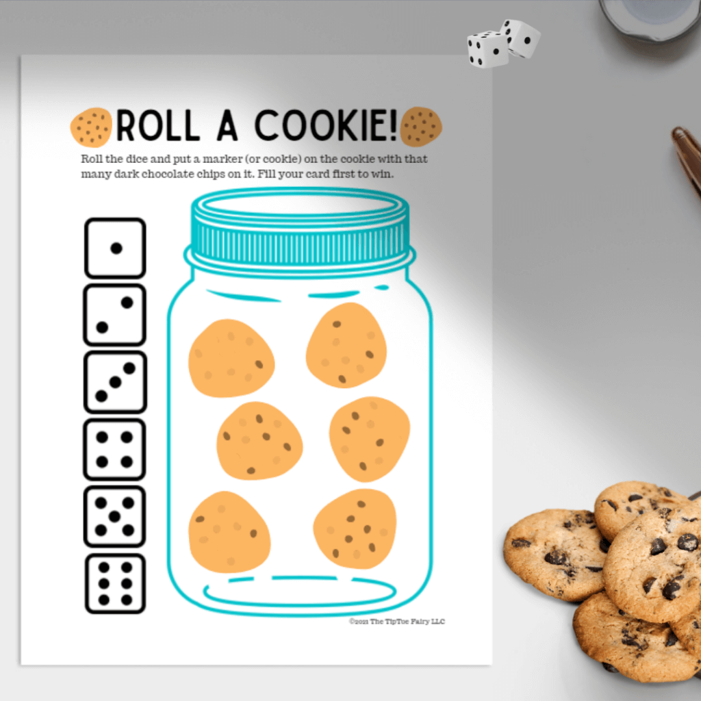 Roll A Cookie game on the table with cookies and dice. 