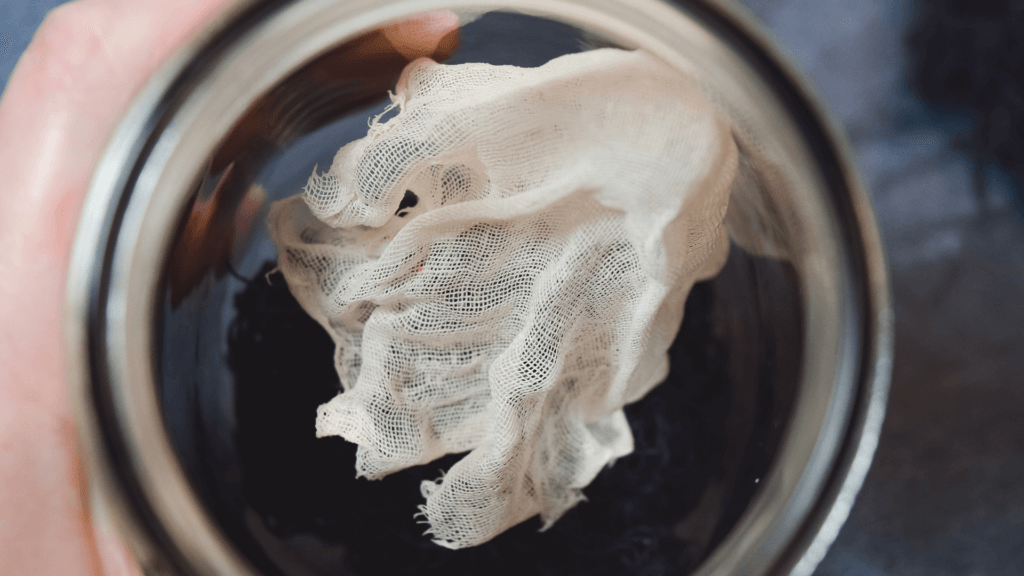 Inside the mason jar with cheesecloth ghost