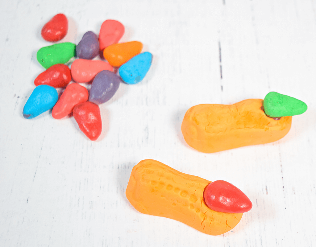 Two witch fingers and a pile of nerds candy corn