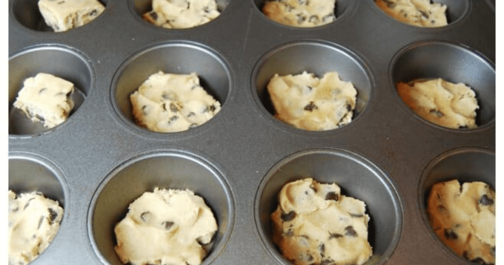 Raw cookie dough in the muffin tins