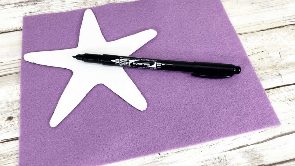 tracing the mermaid starfish wand on purple felt
