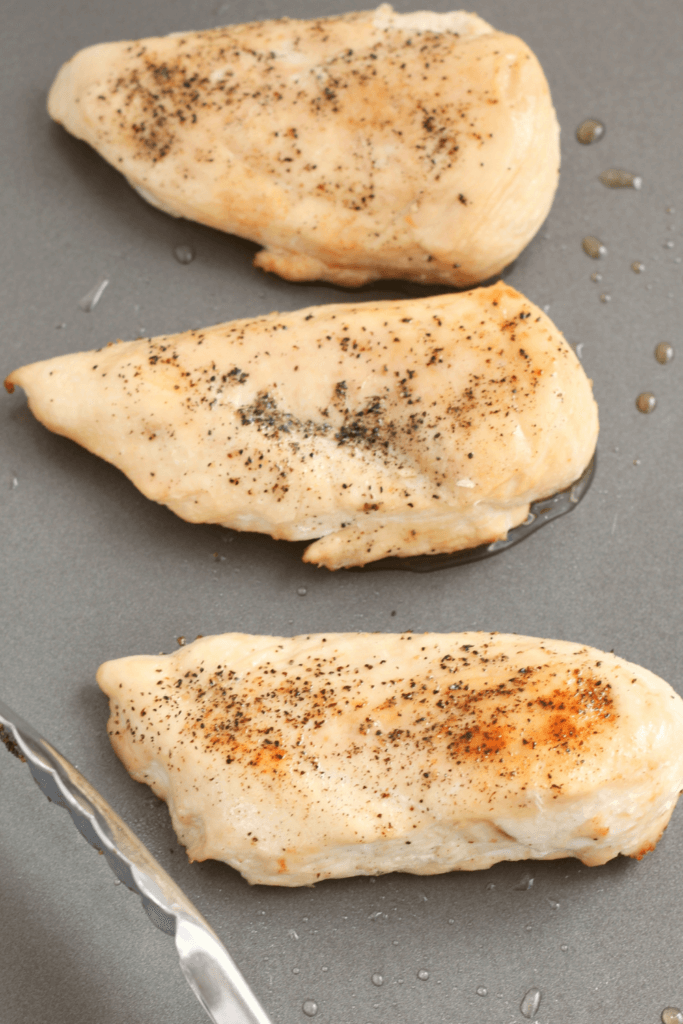 Cooked chicken breasts for the bbq chicken flatbread pizza