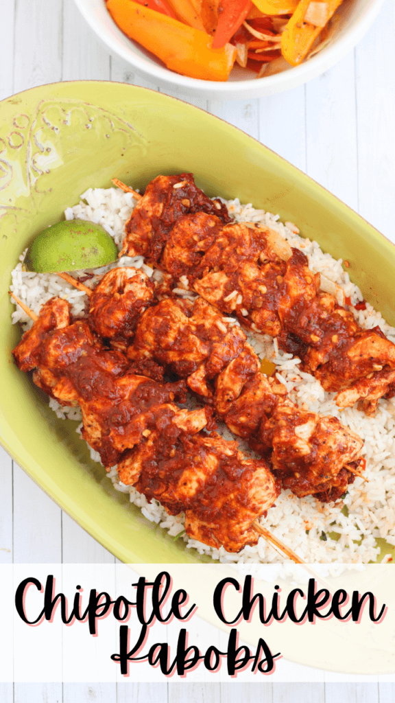 Title image for Chipotle Chicken Kabobs on a green platter with a bed rice of a lime slice
