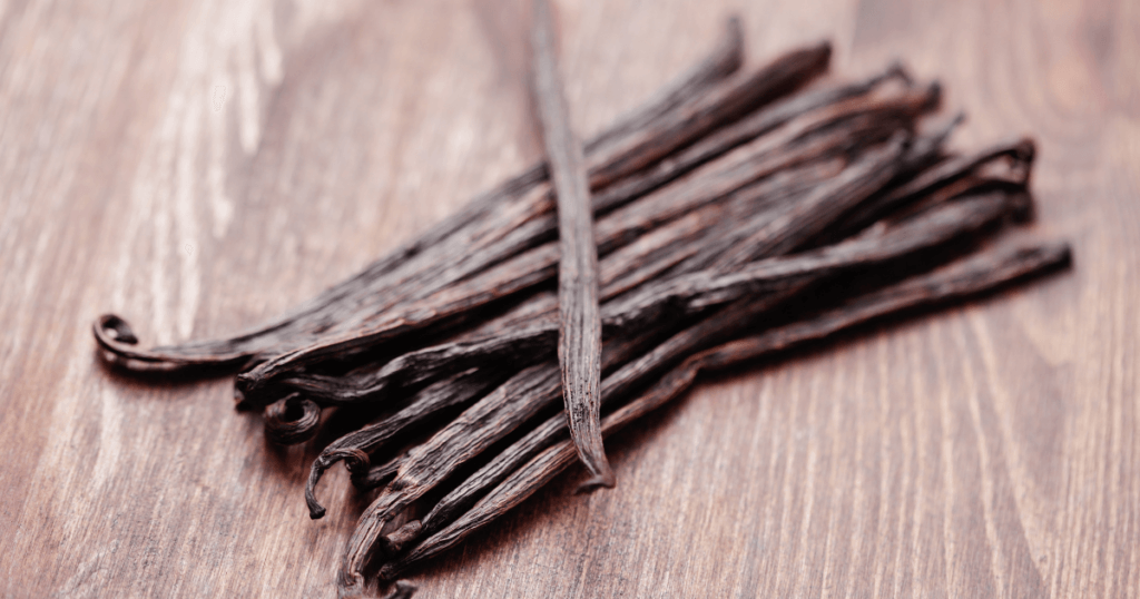 A pile of vanilla bean pods to be used to make vanilla extract. 
