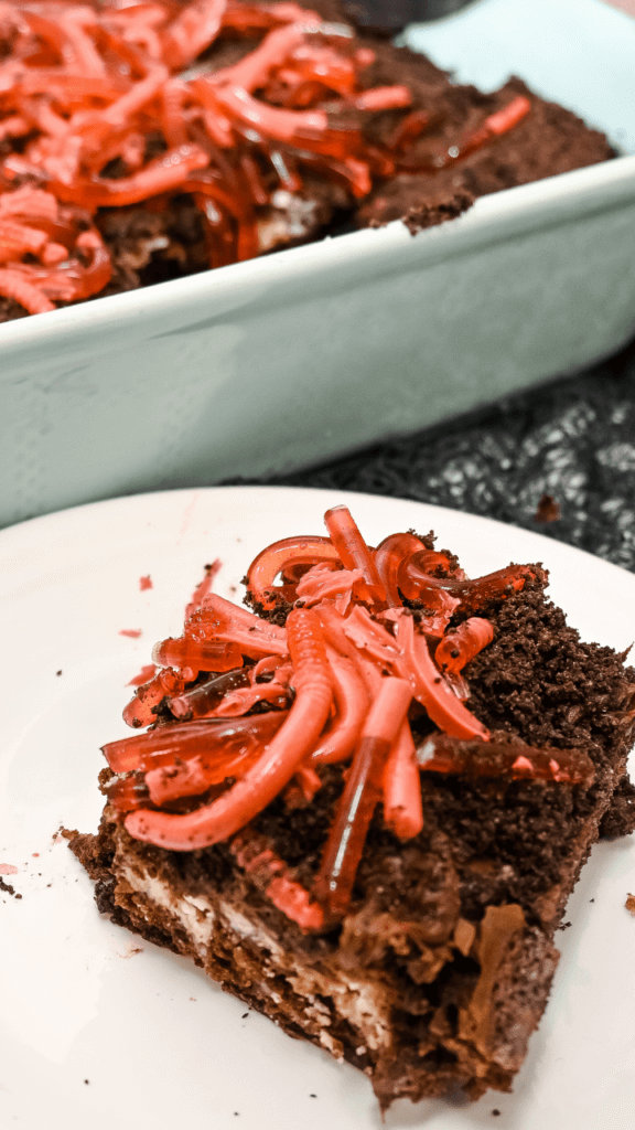 Close up of a slice of Dirt Worm Cheesecake Brownies