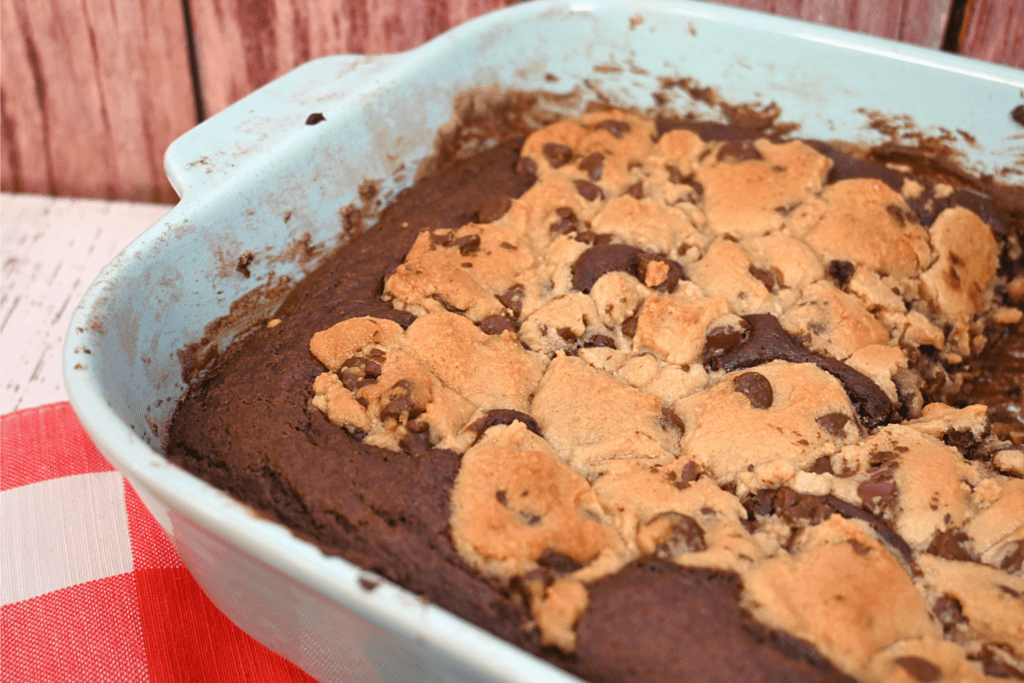 Close up of pan full of chocolate chip cookie dough dump cake 