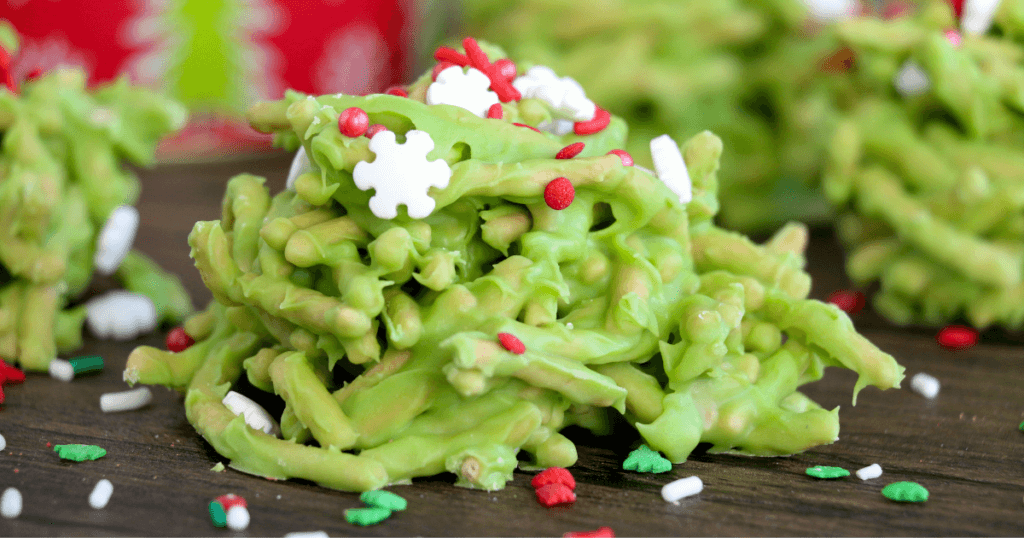 Close up of a finished Christmas Haystacks Cookie with sprinkles on top