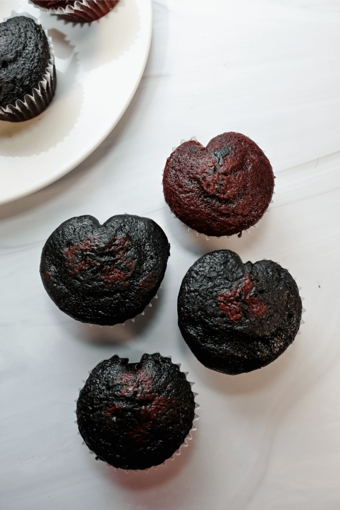 The finished black heart cupcakes after baking