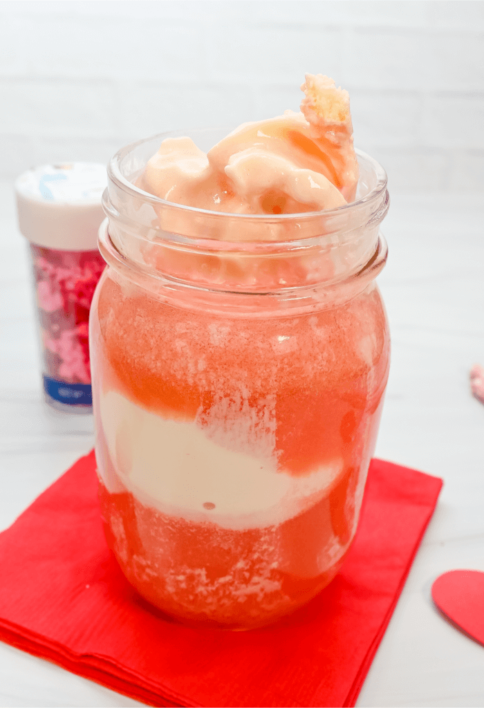 Mason jar glass with ice cream and Hawaiian Punch 