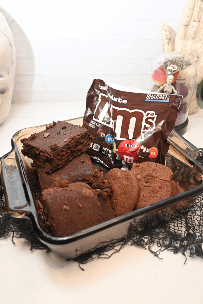 Ingredients of brownies, M&Ms, and chocolate cookies for sorting hat brownies