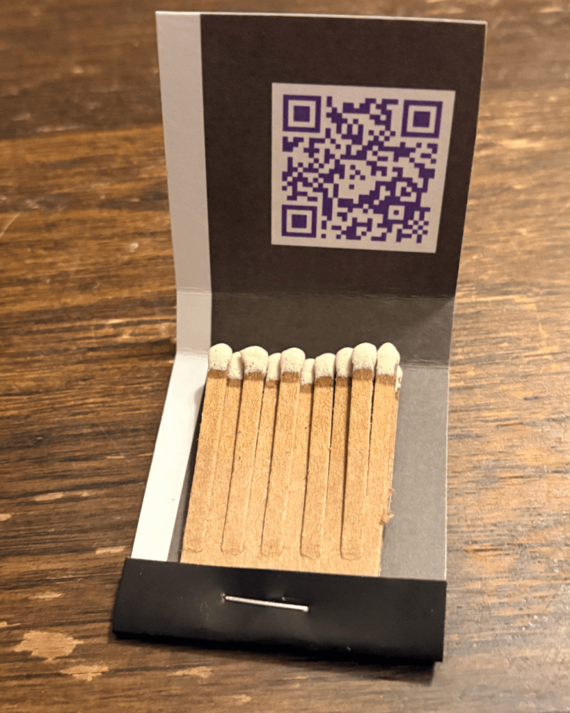 After placing the matches in the fold and stapling.